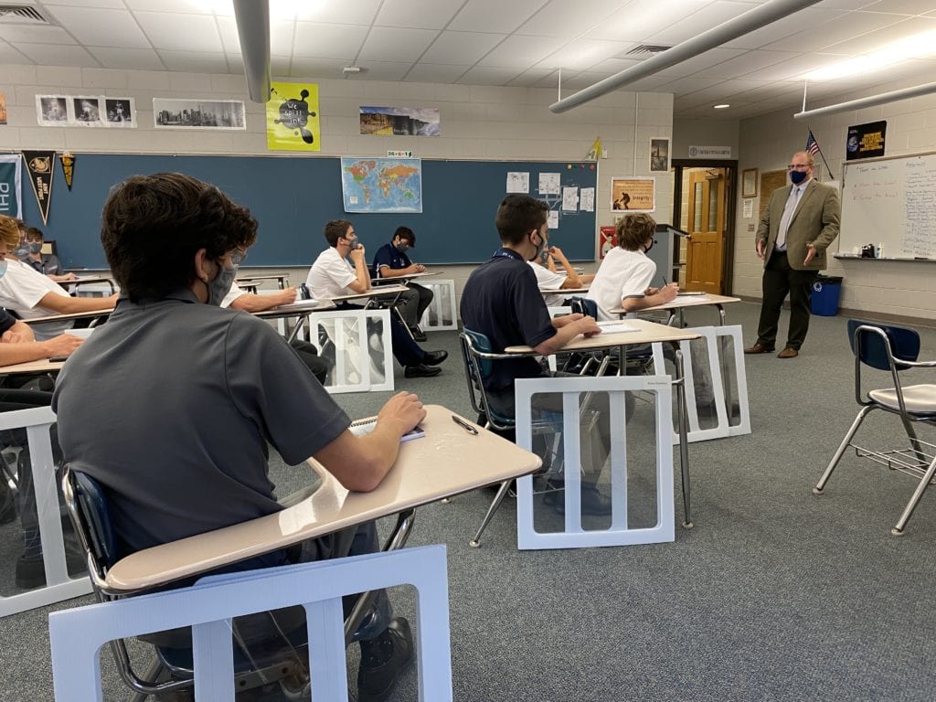 Mr. Boody teaches his Freshman Foundations class at St. Augustine